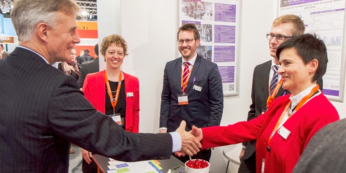 Ambassador Friis Arne Petersen is greeted by professor Anke Hagen at the Hannover Messe 2016